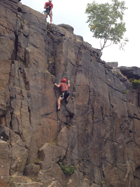 belaying climber derbyshire