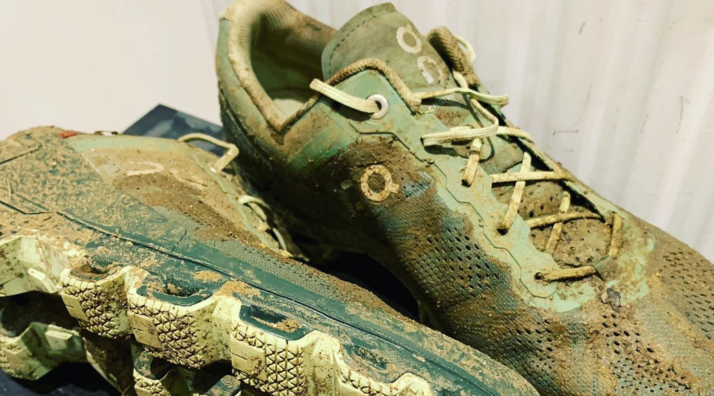 muddy trail running shoes on cloudventure